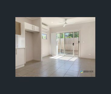 A charming 1-bedroom unit with a study, boasting easy living in a g... - Photo 1