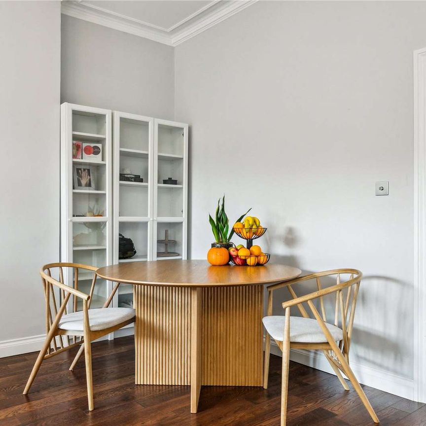 This beautifully designed, spacious two-bedroom period conversion offers over 1,000 sq. ft. of elegant living space on the ground floor of a charming property. - Photo 1