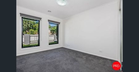 Modern & Comfortable Three-Bedroom Home with Easy Living Appeal - Photo 4