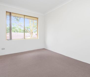 Top-Floor Unit – Your Peaceful Escape Awaits! - Photo 2