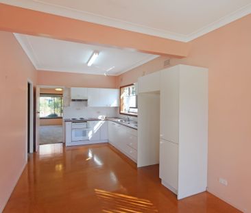 Three Bedroom House In Sought -After Location - Photo 4