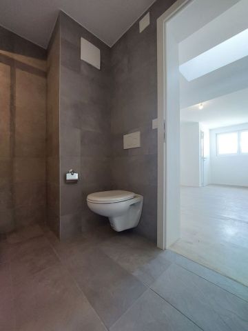 Appartement de 2,5 pièces au 2ème étage avec jardin commun - Photo 5