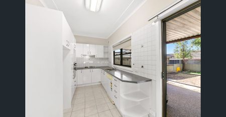 Perfectly Located Three Bedroom Family Home with Air Conditioning! - Photo 3