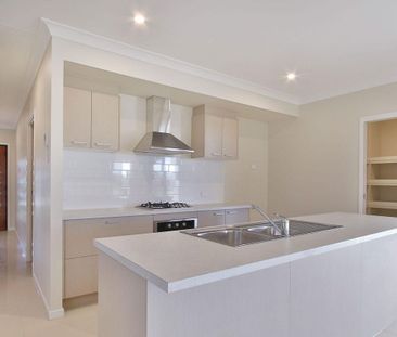 Spacious Modern Home with Ducted AC & Garden Shed - Photo 4
