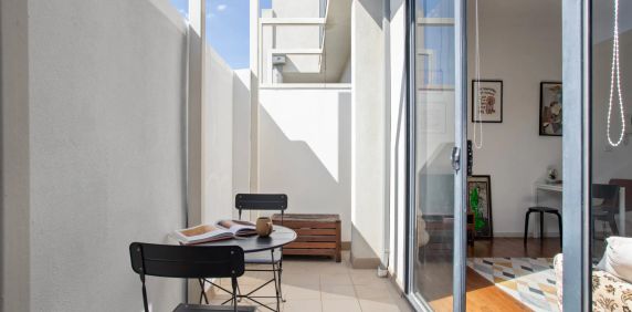 Light-Filled Boutique Living | Flexible 6-Month Lease - Photo 2