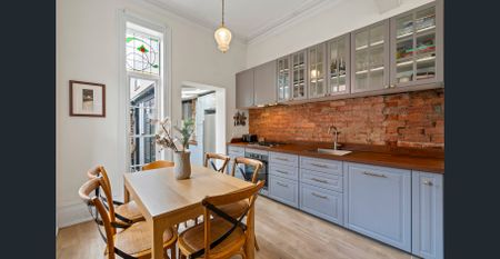 Enchanting Victorian Terrace with Two Valuable Parking Permits! - Photo 3