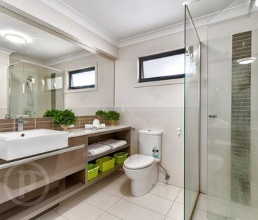 Modern Sophistication Meets Low-Maintenance Living - Photo 5