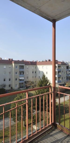 Geförderte Genossenschaftswohnung mit Balkon (Singlewohnung) nähe Traisenpark und Seengebiet - Photo 1