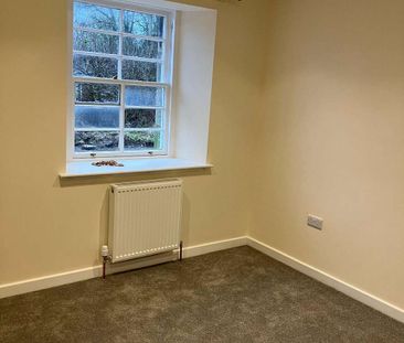 A well-presented two-bedroom semi-detached cottage situated in an a... - Photo 3