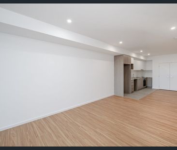 BRAND NEW APARTMENT IN BRAND NEW COMPLEX - Photo 2