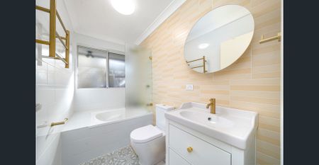 Updated Double Brick 2 Bedroom Unit in Prime Location - Photo 5