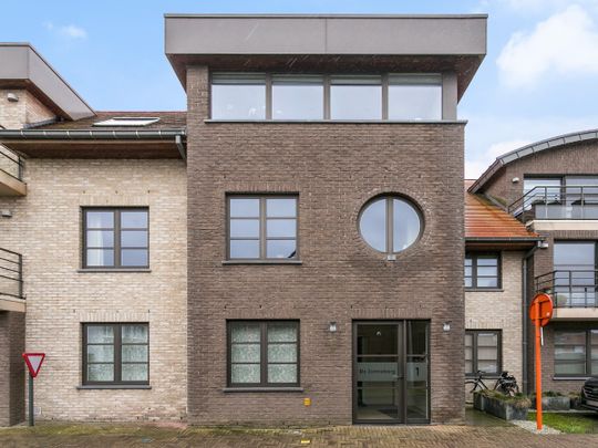 Gelijkvloers appartement met zuidgericht terras en tuin - Photo 1