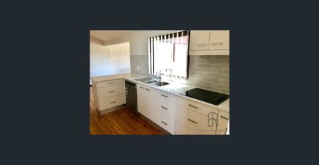 Double storey home with multiple living spaces - Photo 4