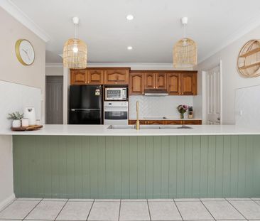 Charming Family Home Opposite Parklands in Sought-After Location - Photo 2