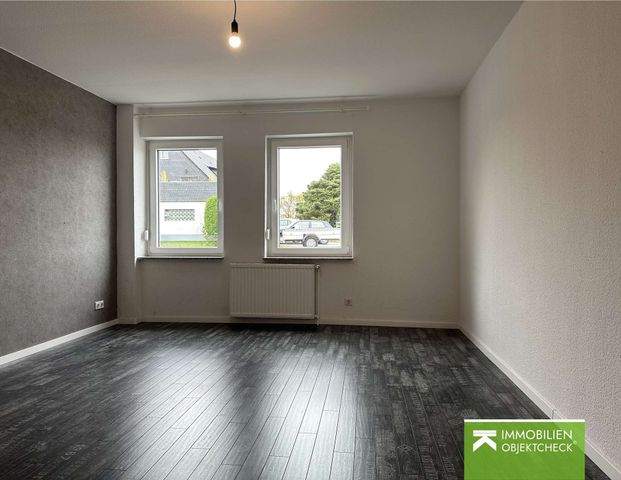 Ihr Rückzugsort im Grünen – charmante Erdgeschosswohnung in idyllischer Lage - Foto 1