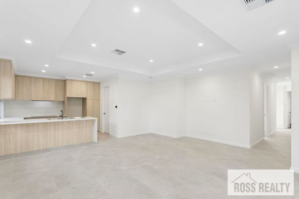 BRAND NEW MODERN HOME WITH QUALITY FINISHES! - Photo 1