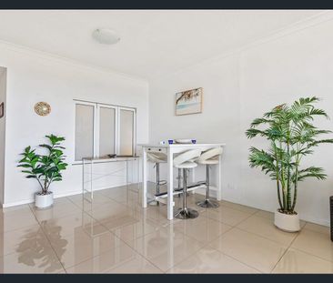 Elevated Coastal Living: Spacious 3rd-Floor Apartment with Resort-S... - Photo 4