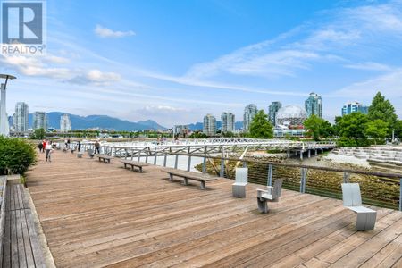 UNFURNISHED-402 138 ATHLETES WAY, Vancouver, British Columbia - Photo 4