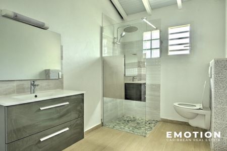 Location Appartement 2 pièces 65m² LES ABYMES 97139 - Photo 5