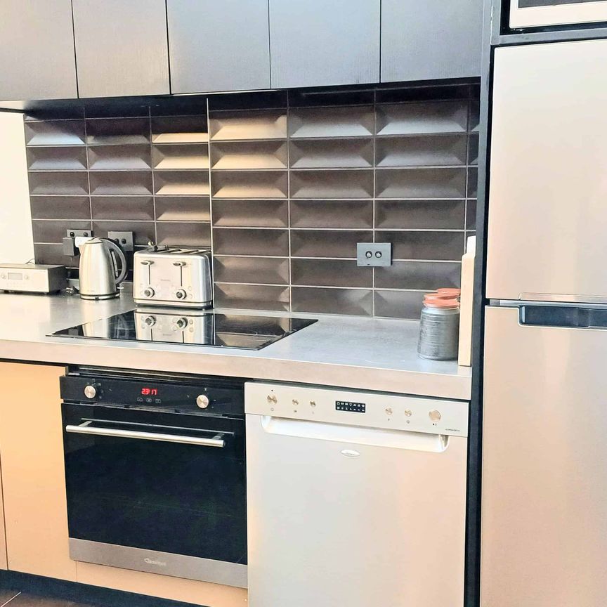 **2026 Heritage Meets Modern Luxury - Fully Furnished Apartment in the Empire Building** - Photo 1
