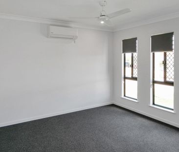 Brand New 4 Bedroom Home with Modern Living - Photo 1