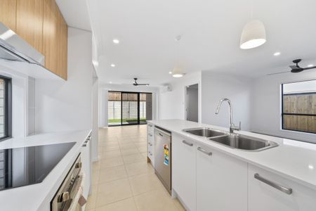 Parkside Family Home with 2 Living Areas, Solar Savings & Walk to Schools and Gym - Photo 2