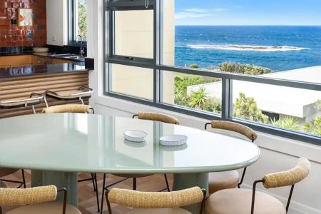 Furnished Coastal Oasis with Panoramic Views and Artistic Flair - Photo 3
