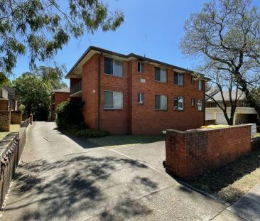 “Charming 2-bedroom Unit” - Photo 1