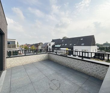 Nieuwbouwappartement met twee slaapkamers, terras en garage - Photo 1