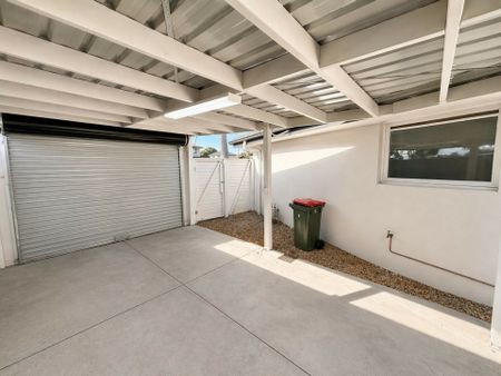 Freshly Updated Family Home with Flexible Living & Secure Parking - Photo 5