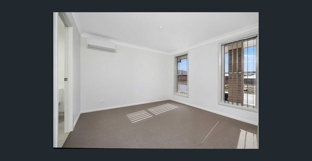 LIGHT-FILLED WITH MULTIPLE LIVING AREAS - Photo 1