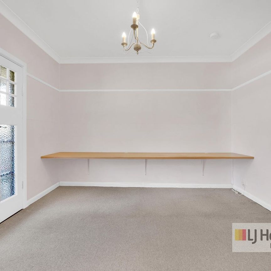 "Charming Family Home" - Photo 1