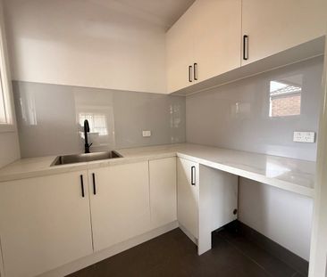 Stylish, Low-maintenance, Four-Bedroom Family Home - Photo 4