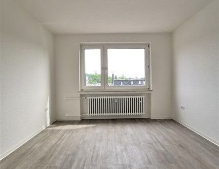 Frisch renovierte 3-Zi.-Whg. mit neuem Boden und Balkon - Foto 1