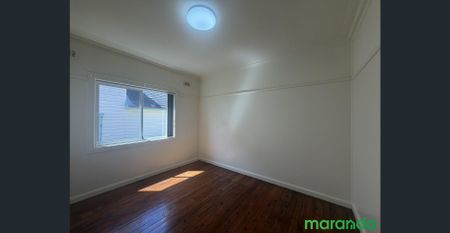 Spacious 3-Bedroom Home with Sunroom & Backyard! - Photo 3