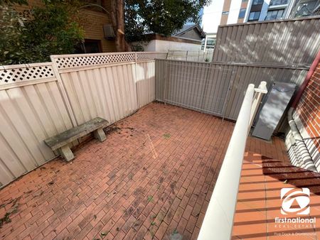 Spacious Two Bedroom Townhouse with Lock-Up Garage - Photo 4