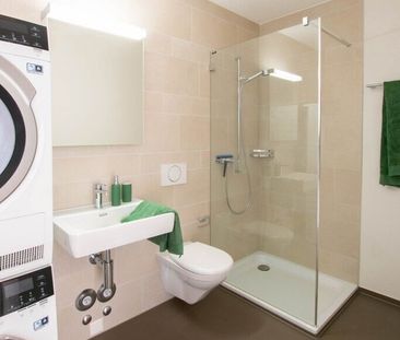 Large and modern 2.5-room apartment in a central location in Lyss - Photo 1