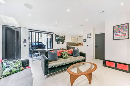 Modern mews home with parking in prime Connaught Village - Photo 3