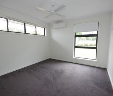 Set in the exclusive "Korora Beach Estate", this home ticks all the... - Photo 3