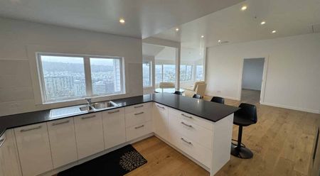 STUNNING NEWLY RENOVATED THREE BEDROOM THREE ENSUITE TOP FLOOR APARTMENT! - Photo 3