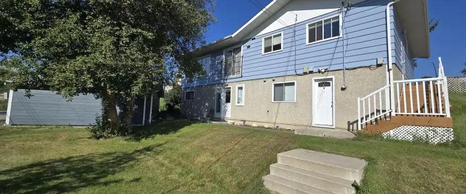 Utilities Included! Three bedroom lower suite | 11B Highland Place NW, Calgary - Photo 1