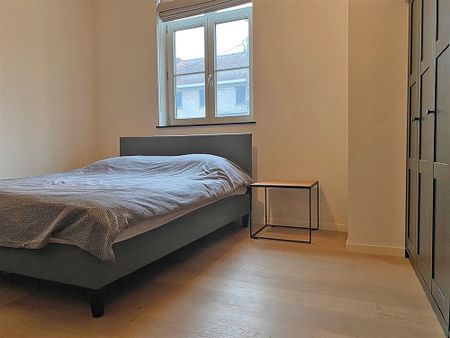 GELIJKVLOERS APPARTEMENT met 2 slaapkamers, terras en 2 staanplaatsen - Photo 2