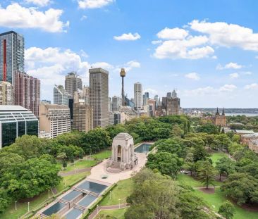 NORTH FACING HYDE PARK APARTMENT WITH HARBOUR VIEWS - Photo 4