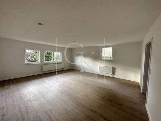 Erstbezug nach Modernisierung von geräumiger Souterrain-Wohnung (2 ZKDB) mit Terrasse und Stellplatz - Photo 1