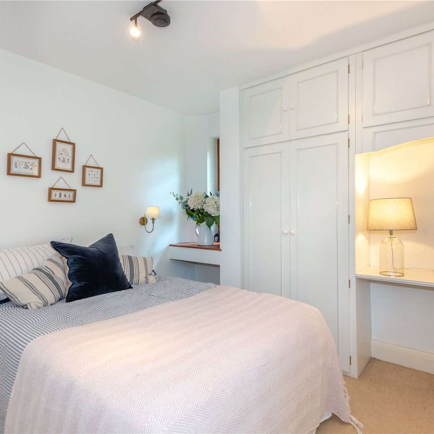 Situated in one of the most sought after roads in Englefield Green, a detached house full of character set in magnificent gardens with swimming pool. - Photo 1