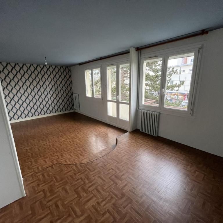 F3 RUE AUGUSTE LECHESNE - Photo 1