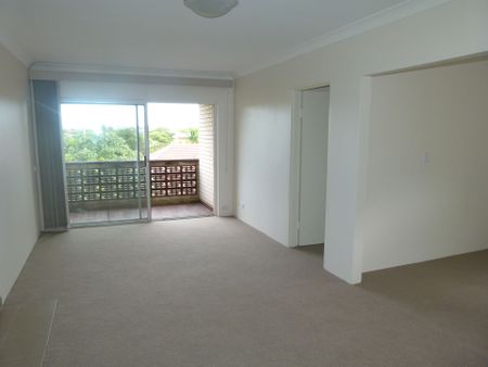 Spacious&comma; Top Floor&comma; Renovated Apartment with Lock up Garage - Photo 3