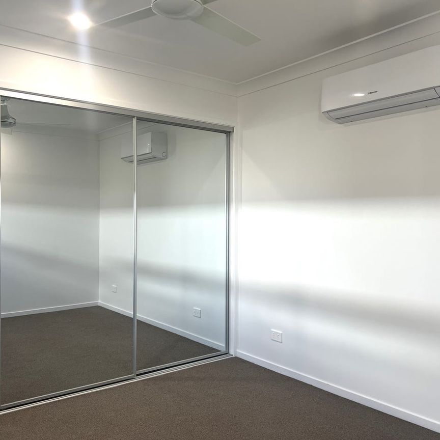 BRAND NEW modern and spacious three-bedroom duplex home. - Photo 1