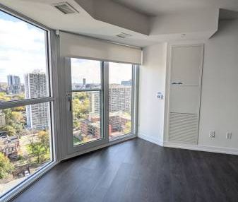 Feels brand new floor to ceiling windows! - Photo 2