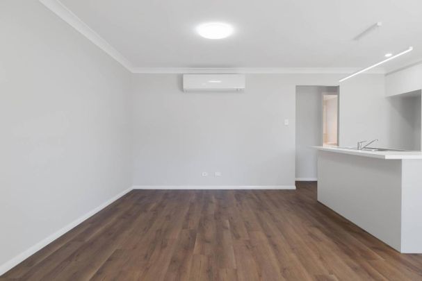 Brand New | Premium Living in the Heart of Newtown - Photo 1